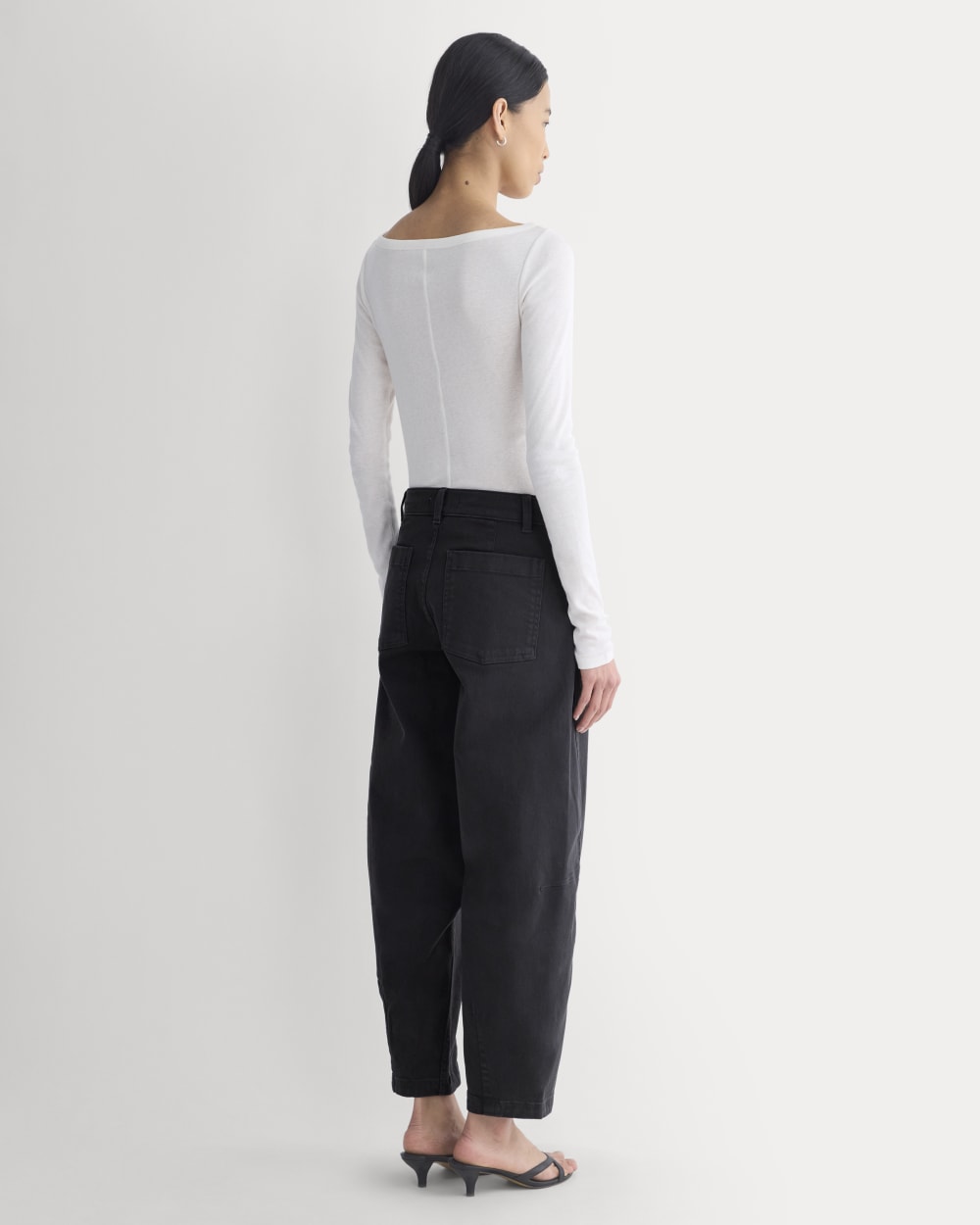 Twisted Seam Barrel Pant in Black — detail view