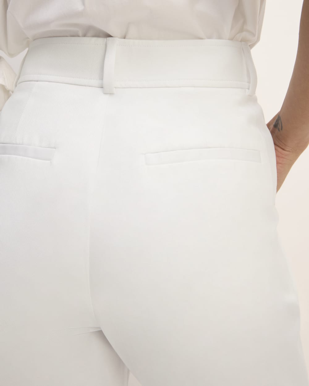 The Draper Tapered Pant in Buttersmooth in White — detail view