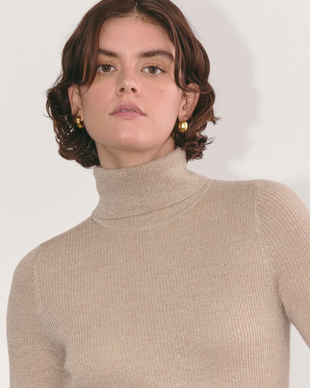The Turtleneck in Lurex Merino in Gold — detail view