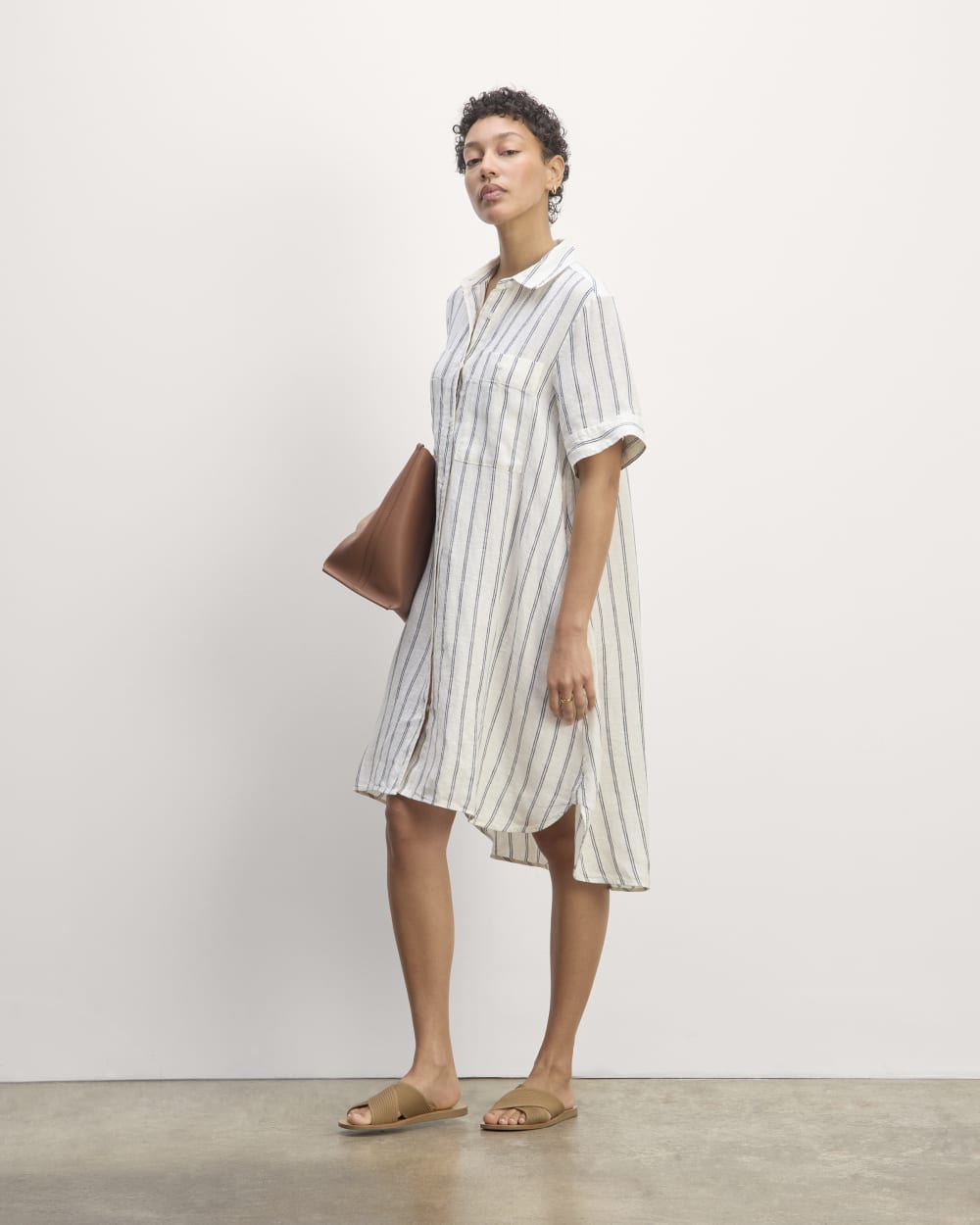 The Daytripper Dress in Linen in Bone/Navy — front view