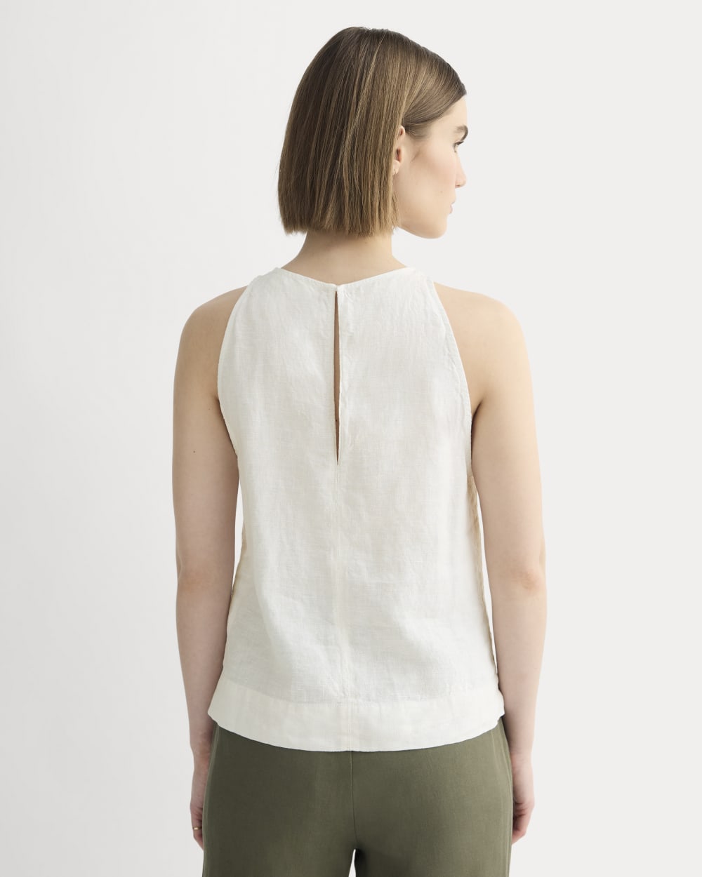The Linen High-Neck Tank in Natural Chambray — detail view