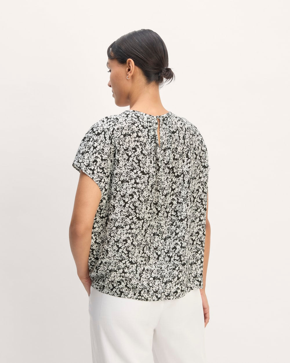 The Gathered Neck Top in Black / Bone Mini Floral — detail view