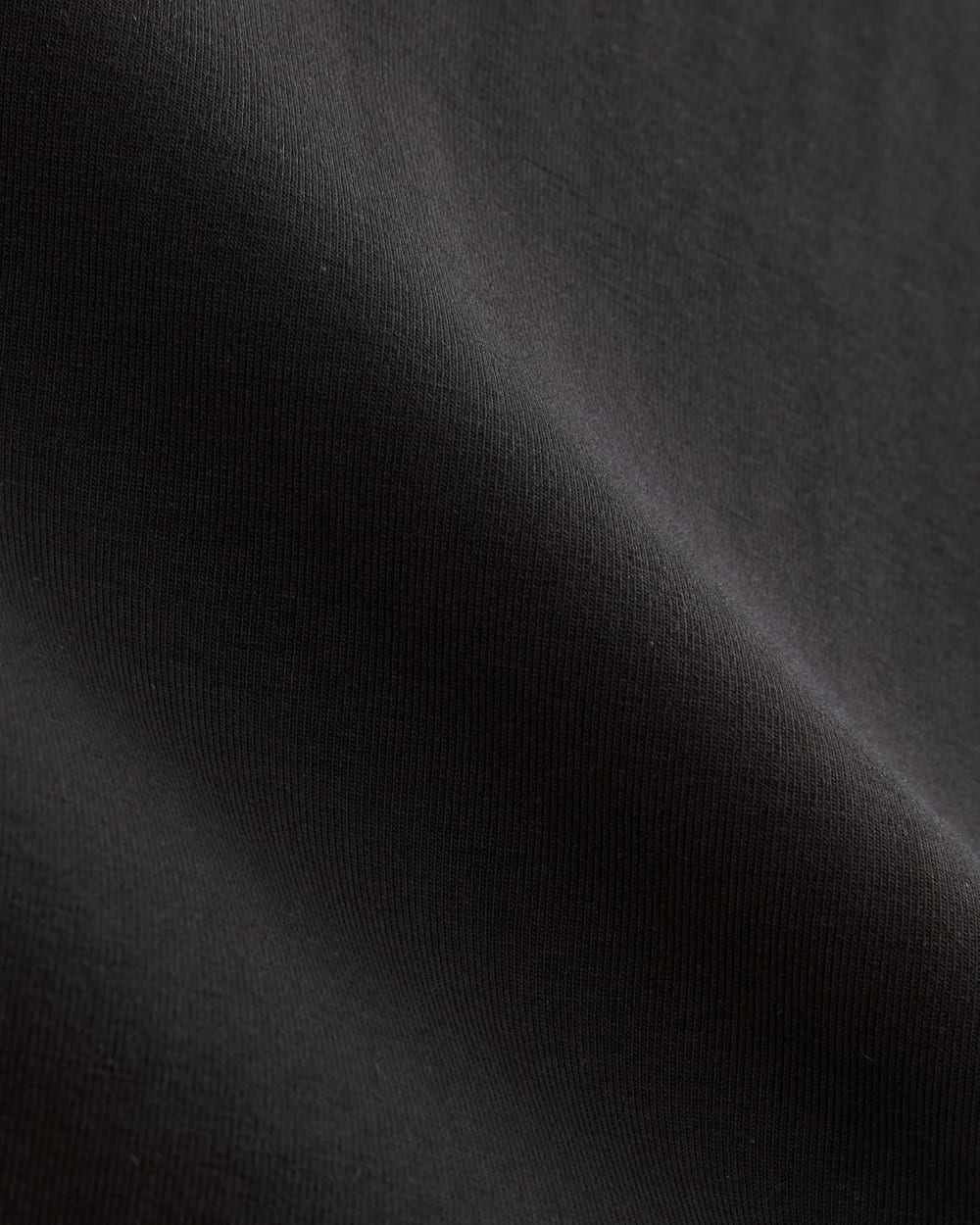 The Form Funnel-Neck Bodysuit in Black — detail view