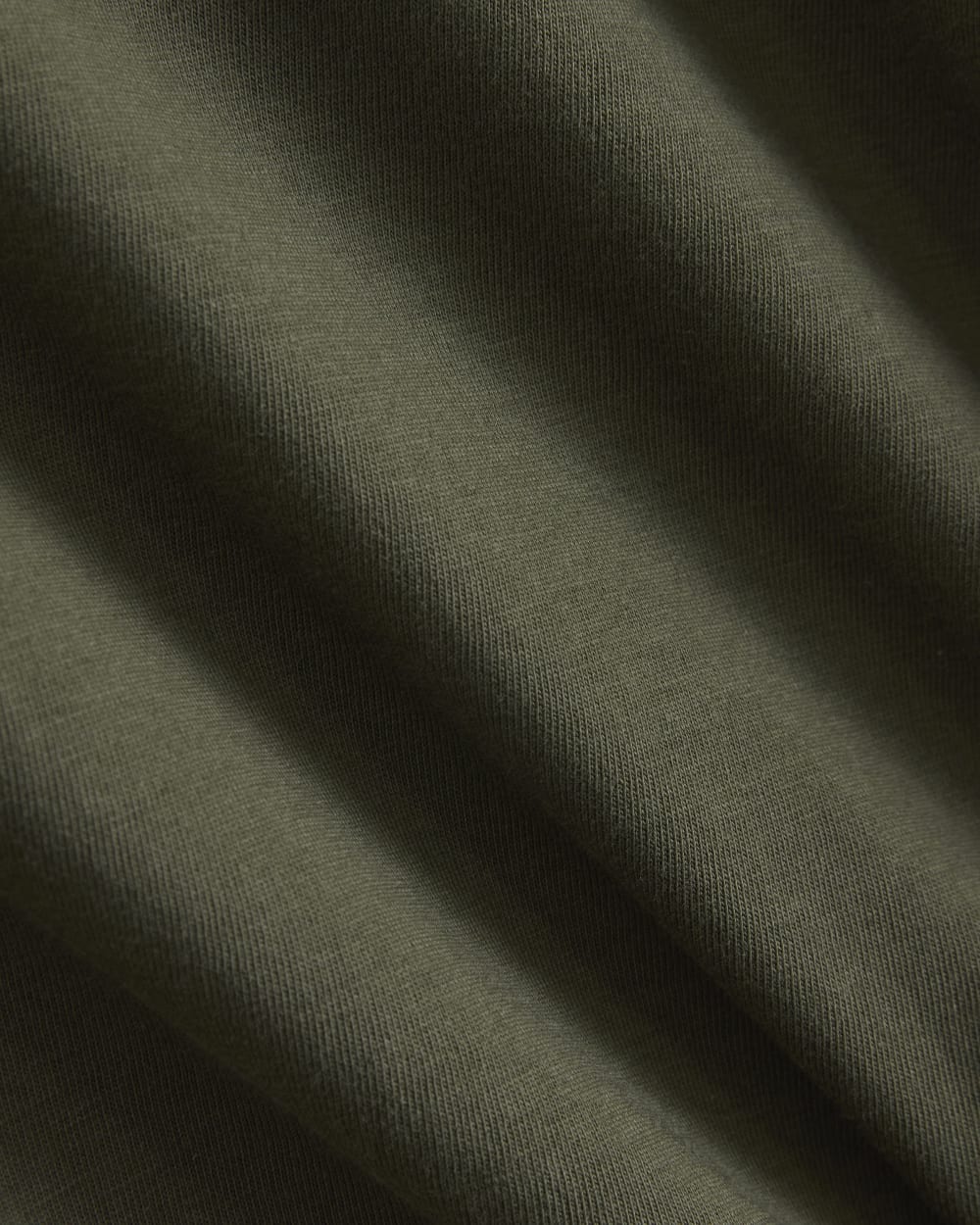 The Box-Cut Tee in Essential Cotton in Olive Night — detail view