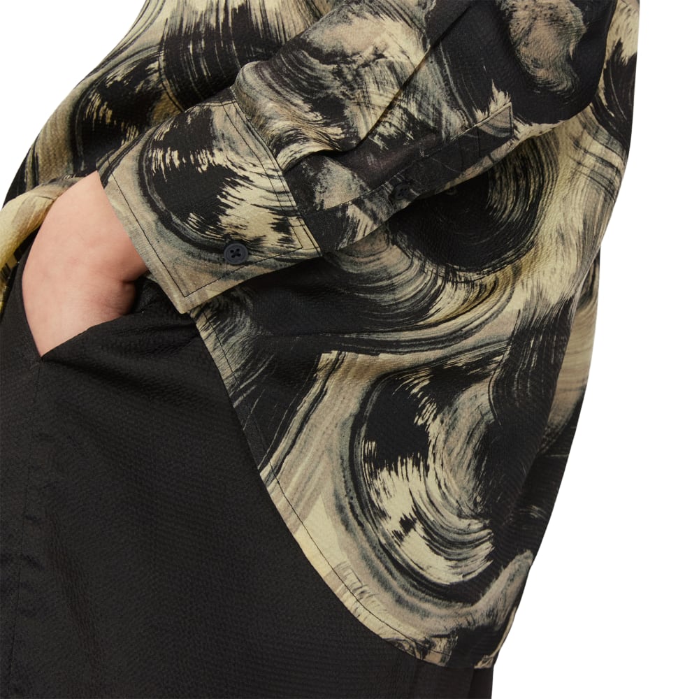 The Satin Relaxed Shirt in Pale Yellow / Black — detail view