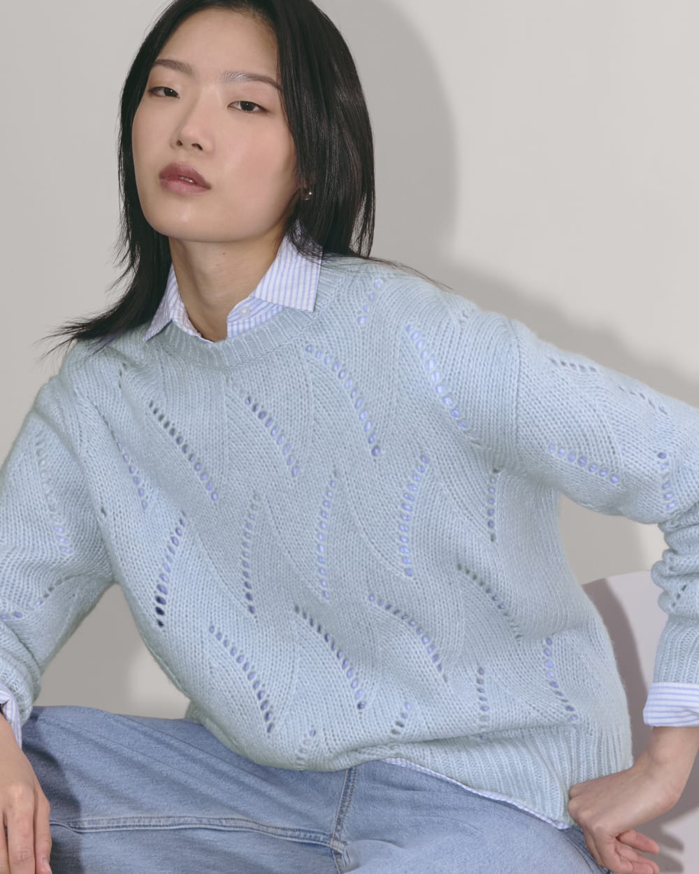 The Pointelle Sweater in Cloud in Chambray Blue — detail view
