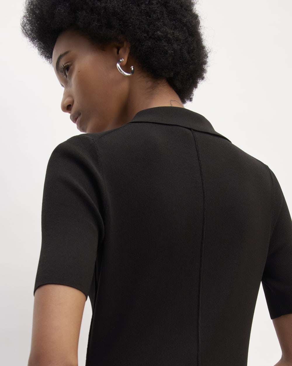The Viscose Knit Polo Midi Dress in Black — detail view