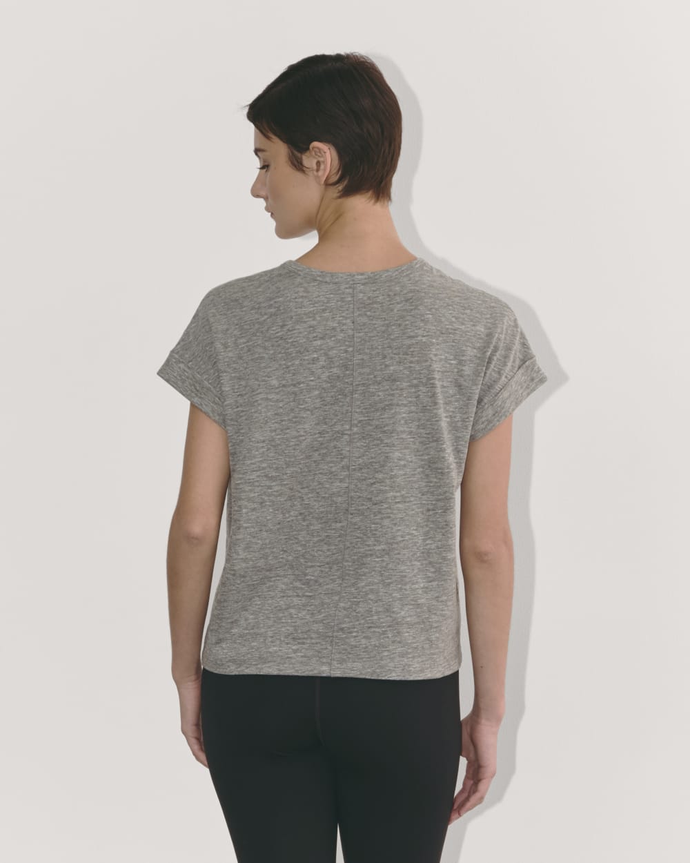 The Perform Tee in Heathered Grey — detail view