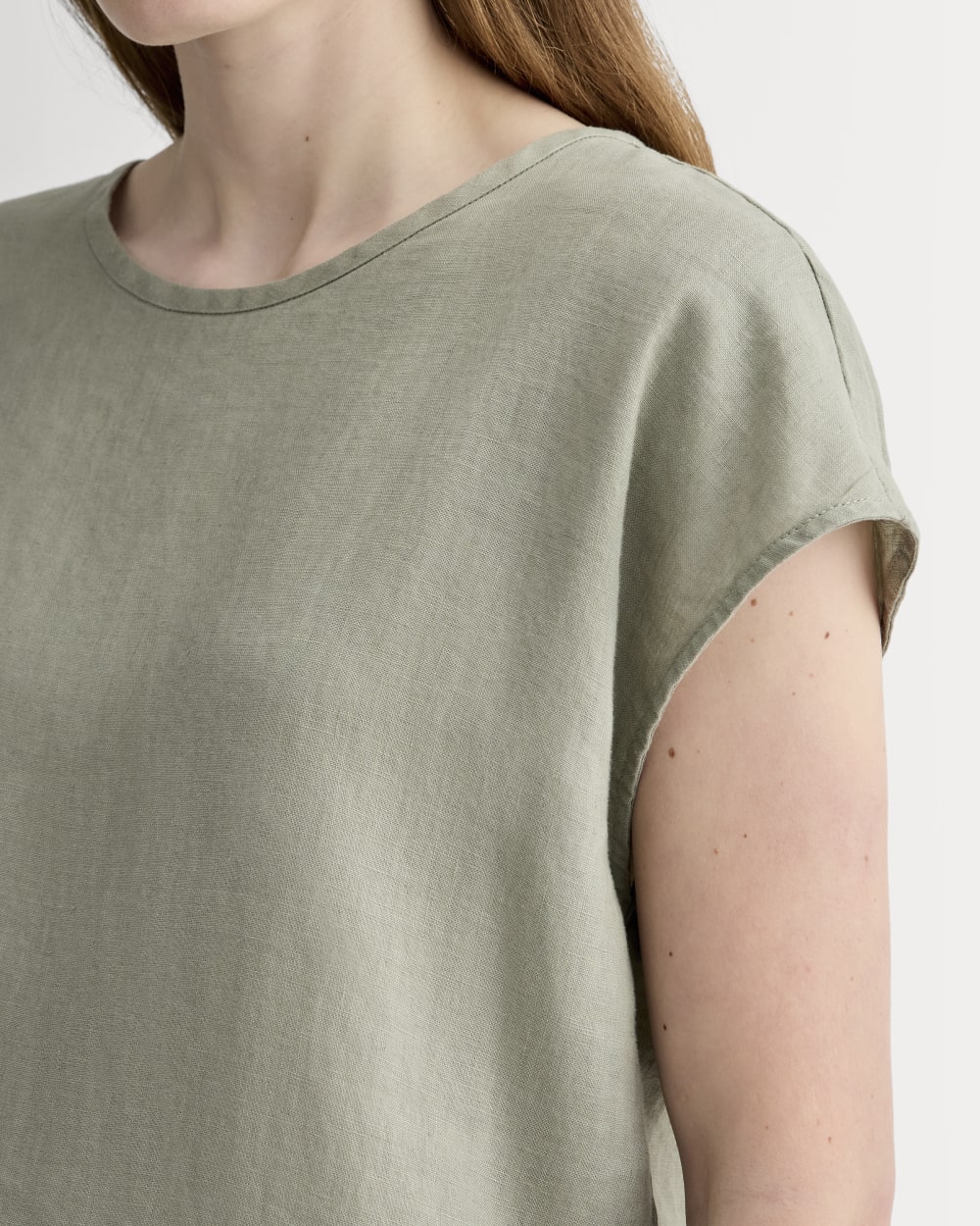 The Muscle Top in Linen in Sage Green — detail view
