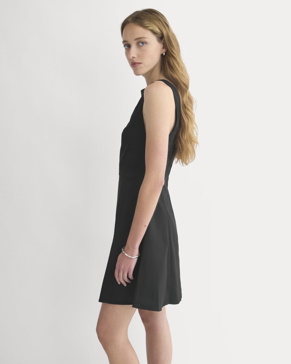 Seamed Open-Back Mini Dress in Black — detail view