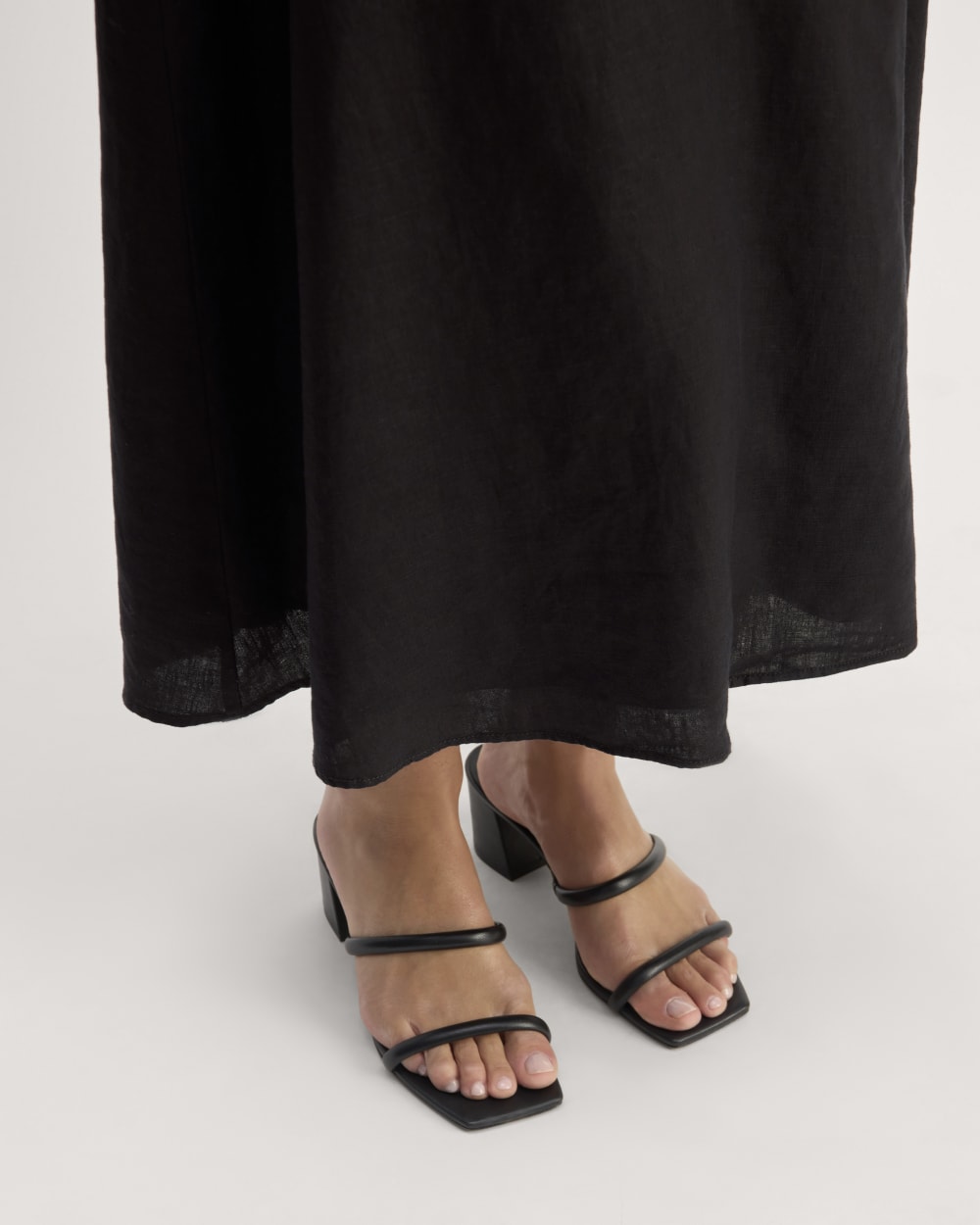 The Linen Halter-Neck Dress in Black — detail view