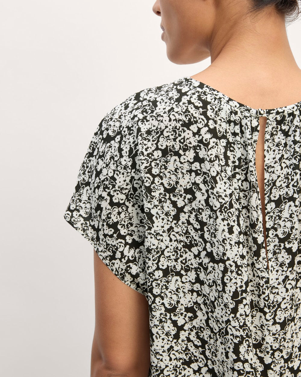 The Gathered Neck Top in Black / Bone Mini Floral — detail view