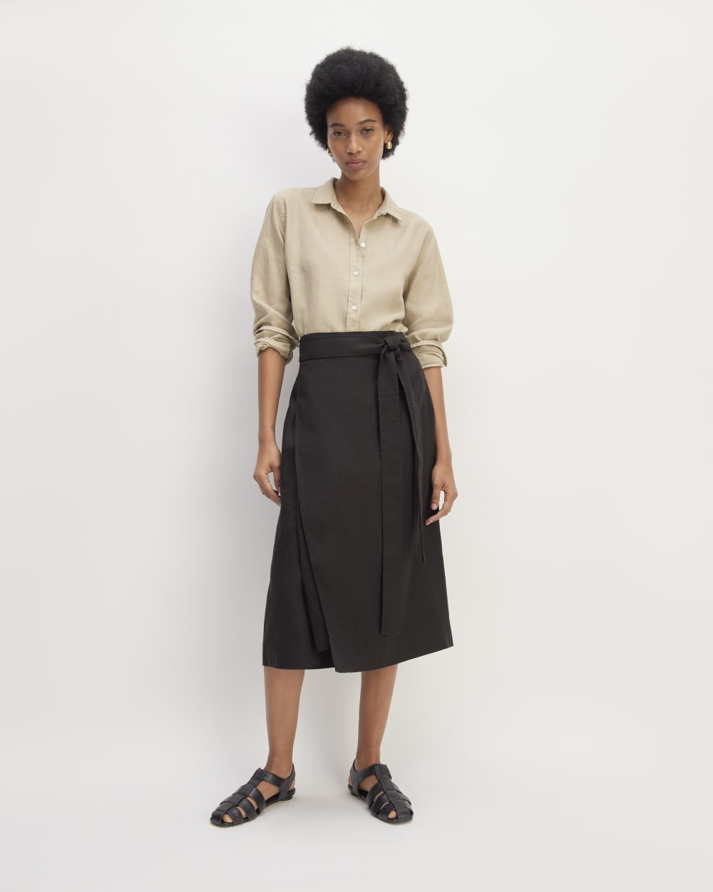 The Linen Wrap Skirt in Black — front view
