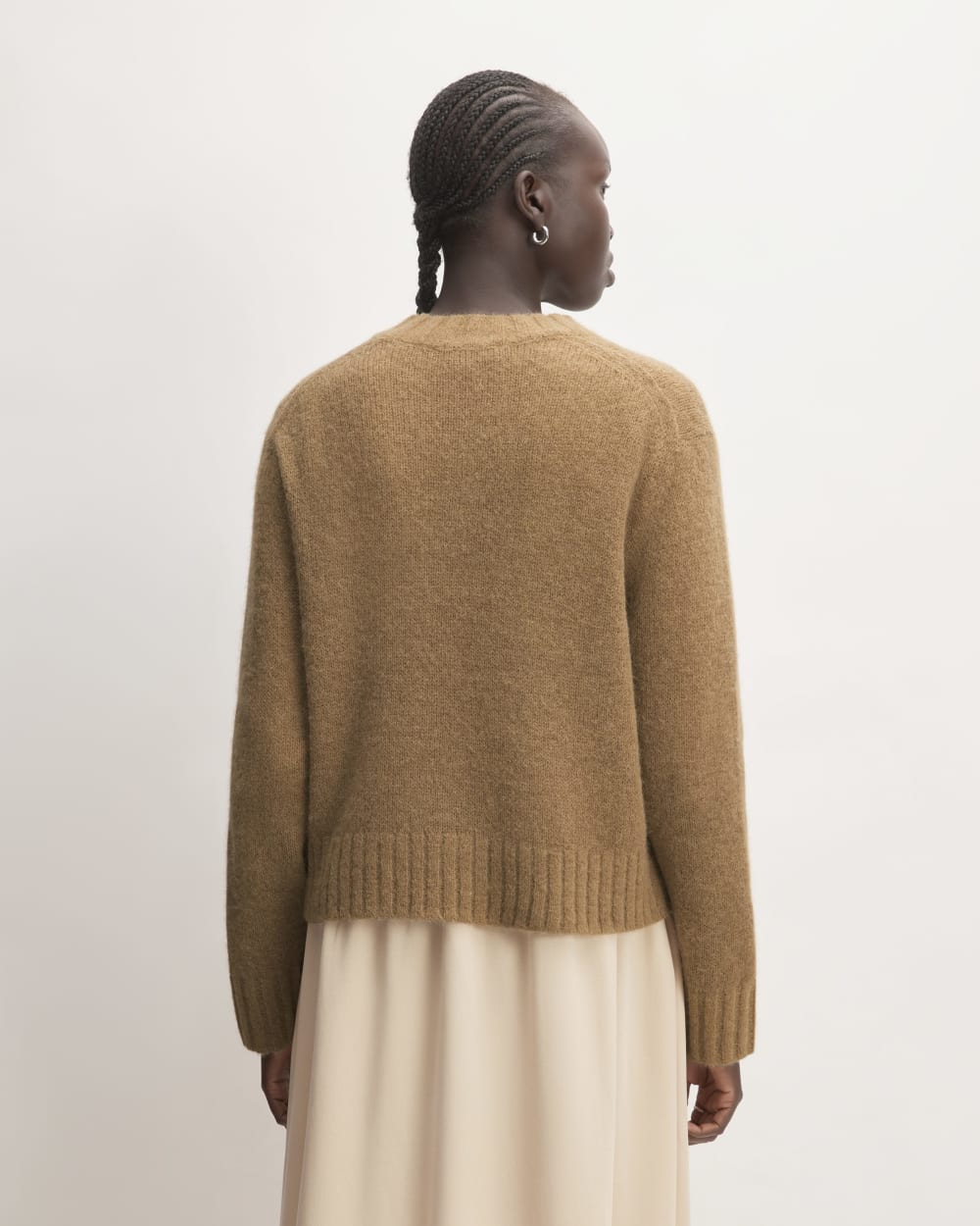 The Alpaca Cropped Crewneck Sweater in Tiger's Eye — detail view