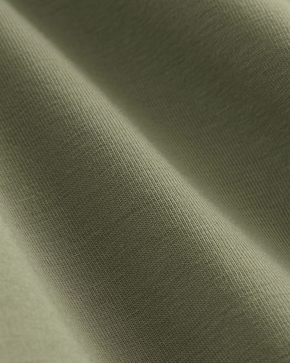 The Form Halter Top in Lichen Green — detail view