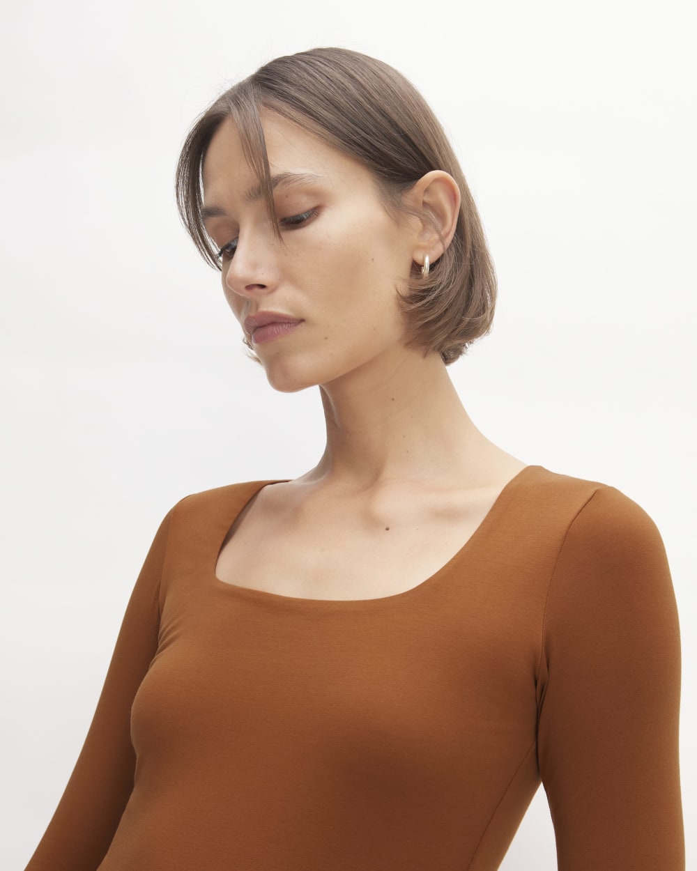 The Long-Sleeve Supima® Square-Neck Bodysuit in Honey — detail view