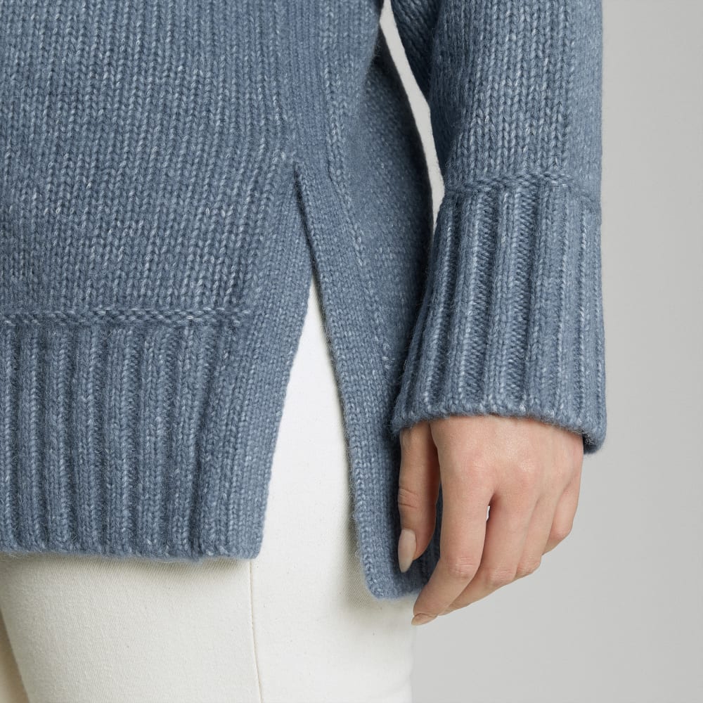 The Cloud Turtleneck in Faded Blue — detail view