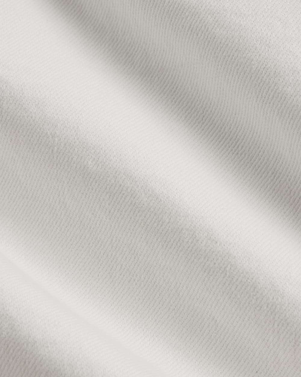 The A-Line Denim Short in White — detail view