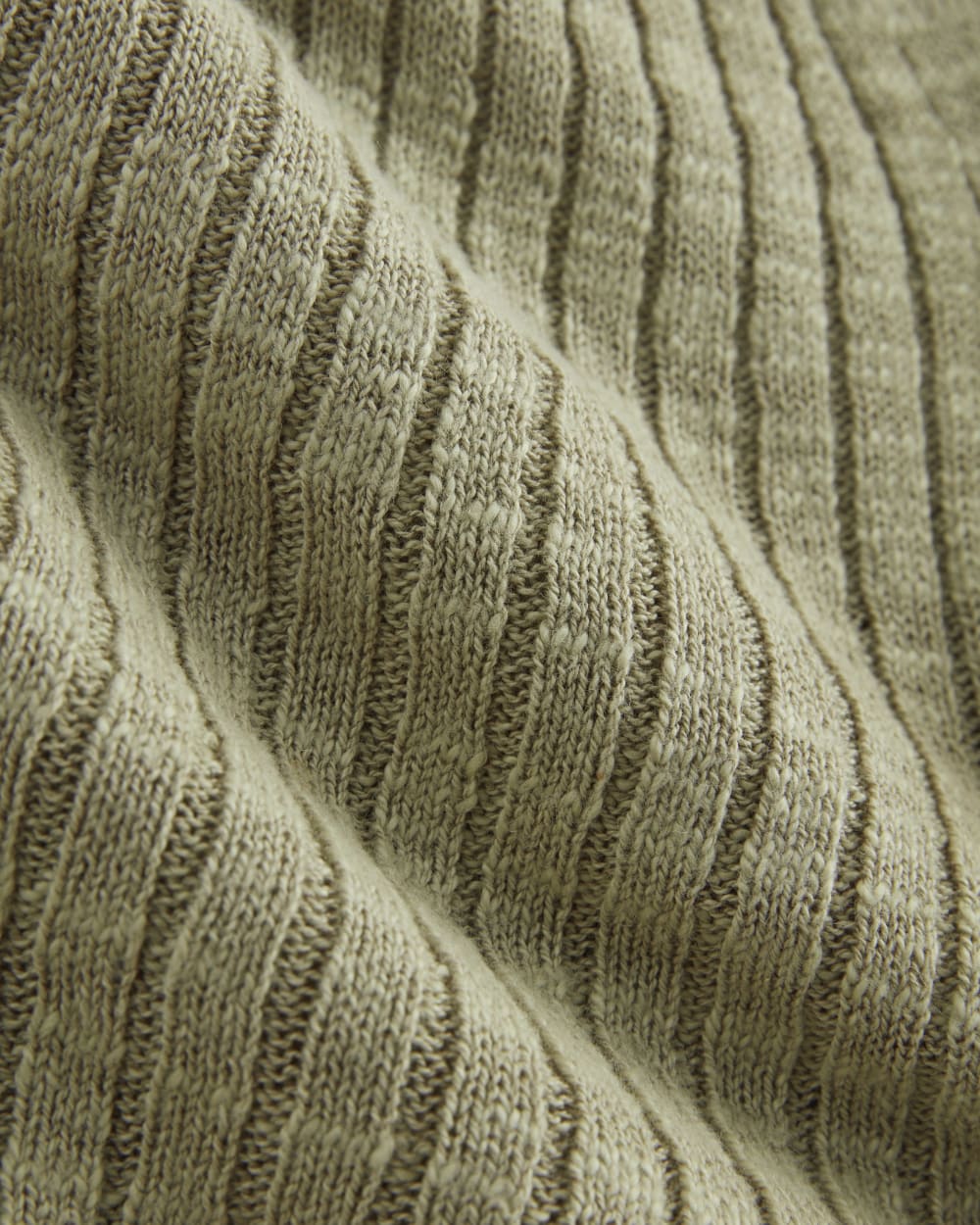 The Ribbed Cardigan in Cotton Linen in Eucalyptus — detail view