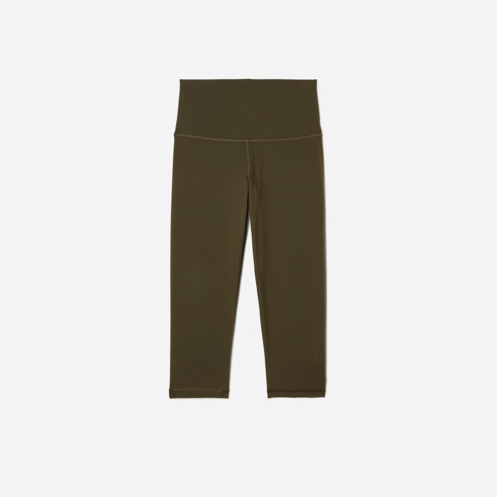 The Perform Cropped Legging in Dark Olive — front view