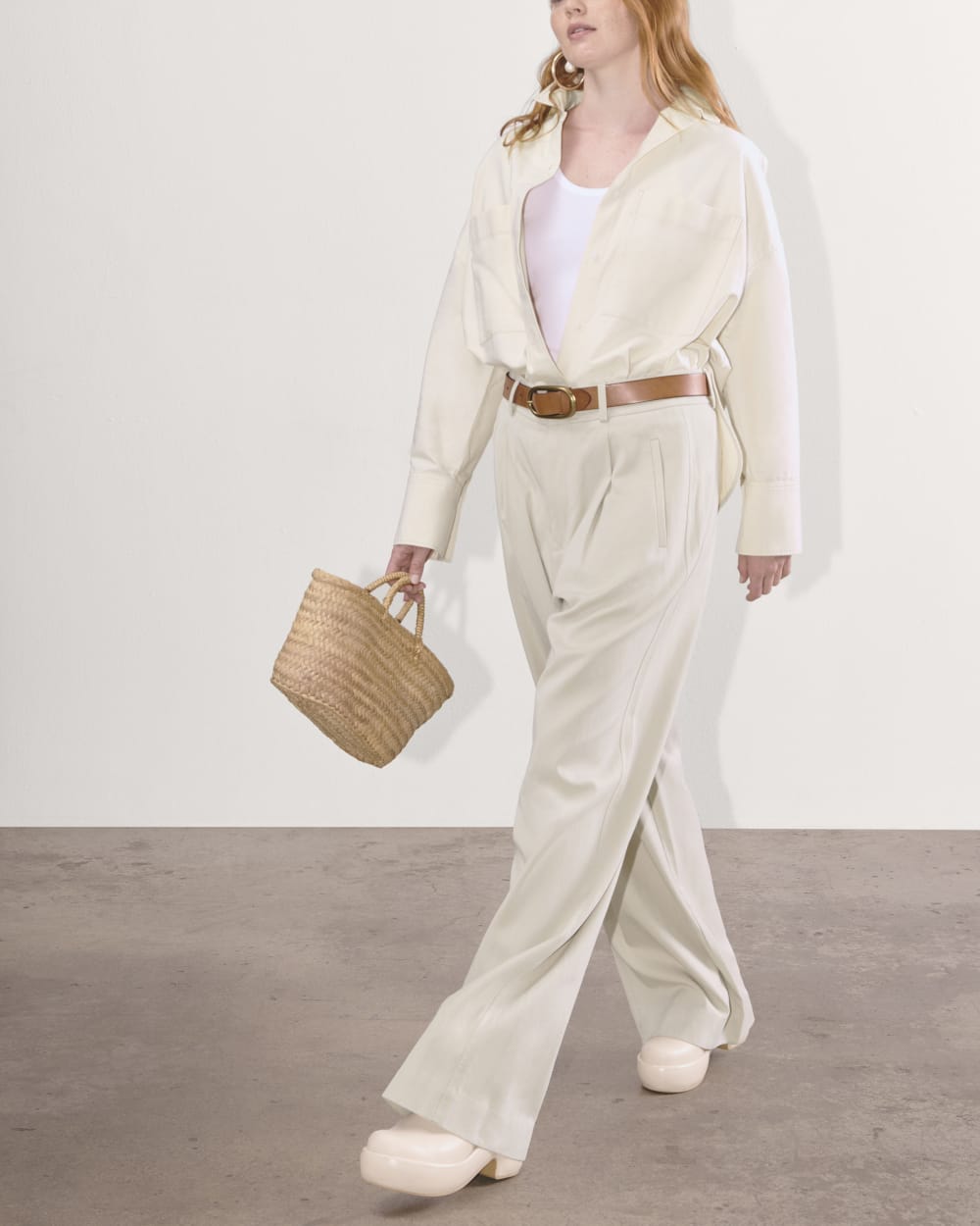 The Draper Pleated Pant in Buttersmooth in Sandstone — detail view