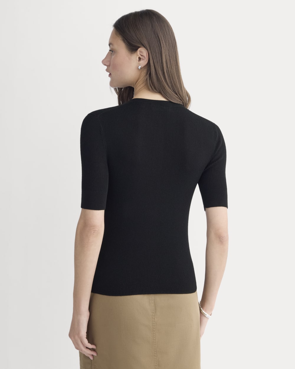 The Short-Sleeve Henley in Ultrasoft Merino in Black — detail view