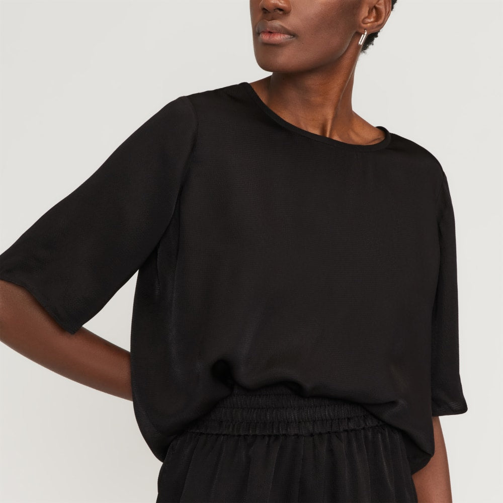 The Satin Relaxed Tee in Black — detail view