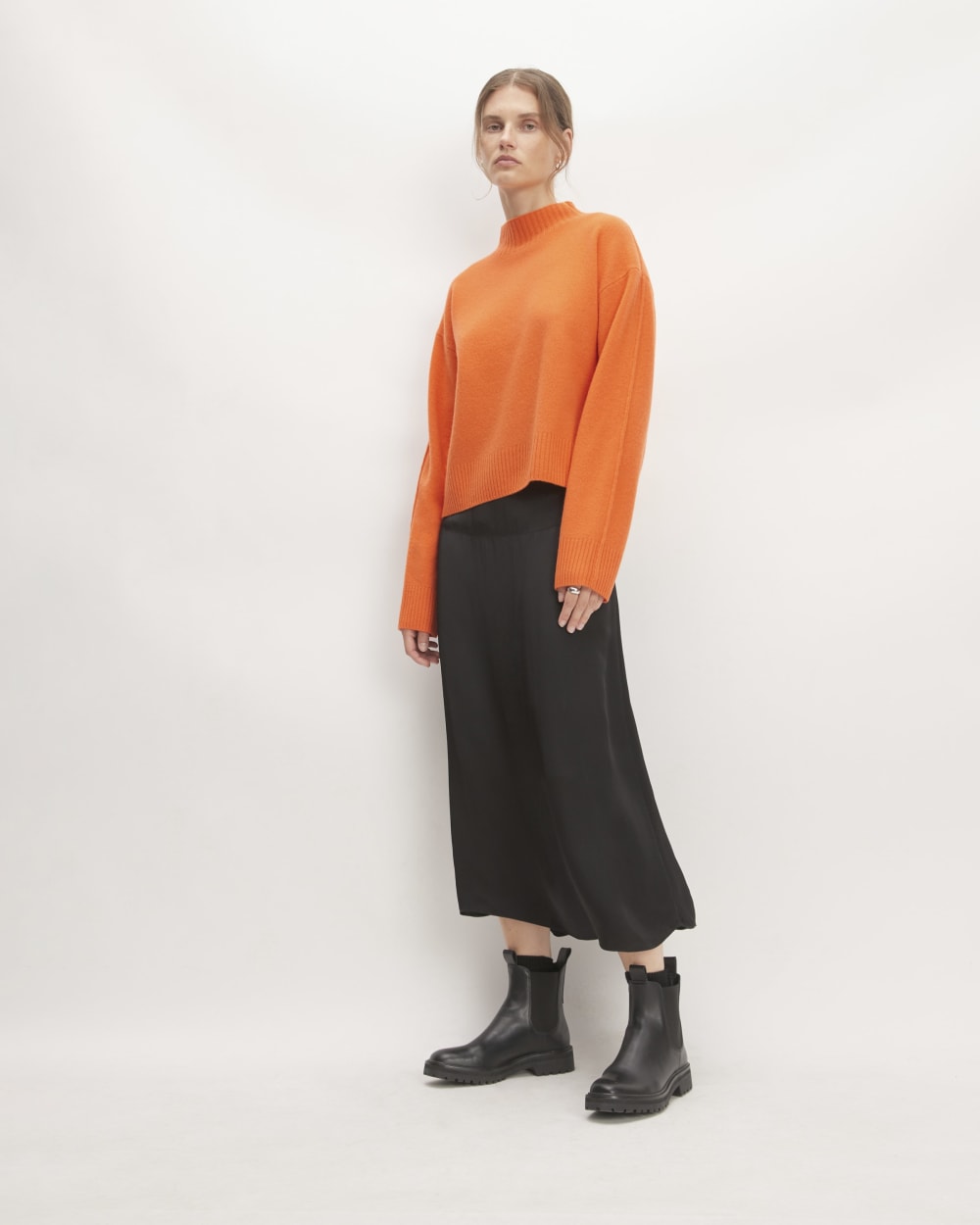The Good Merino Wool Mockneck Sweater in Orange — detail view