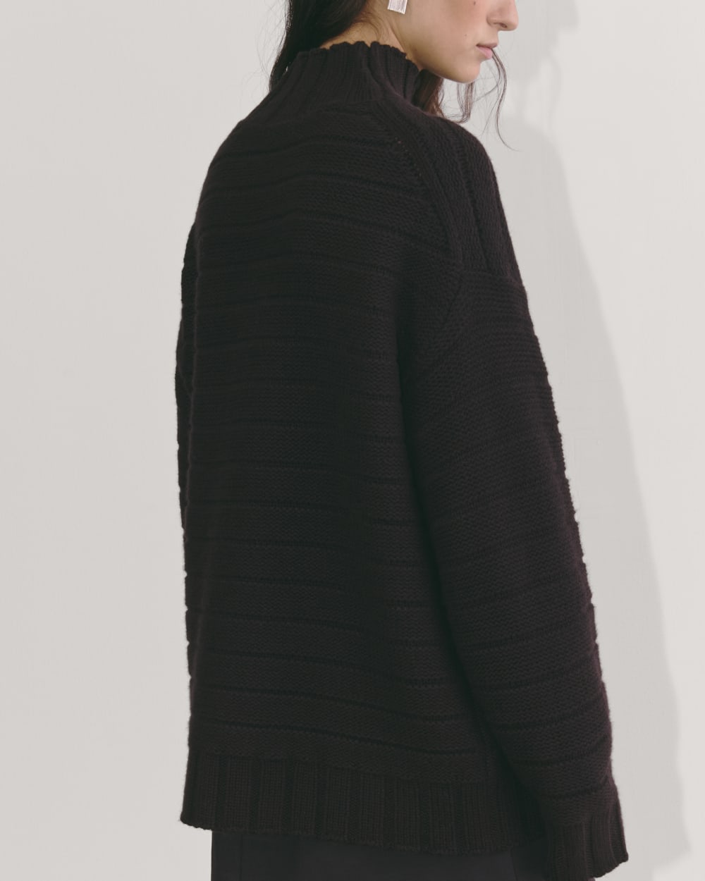 The Oversized Turtleneck in Luxe Merino in Black — detail view