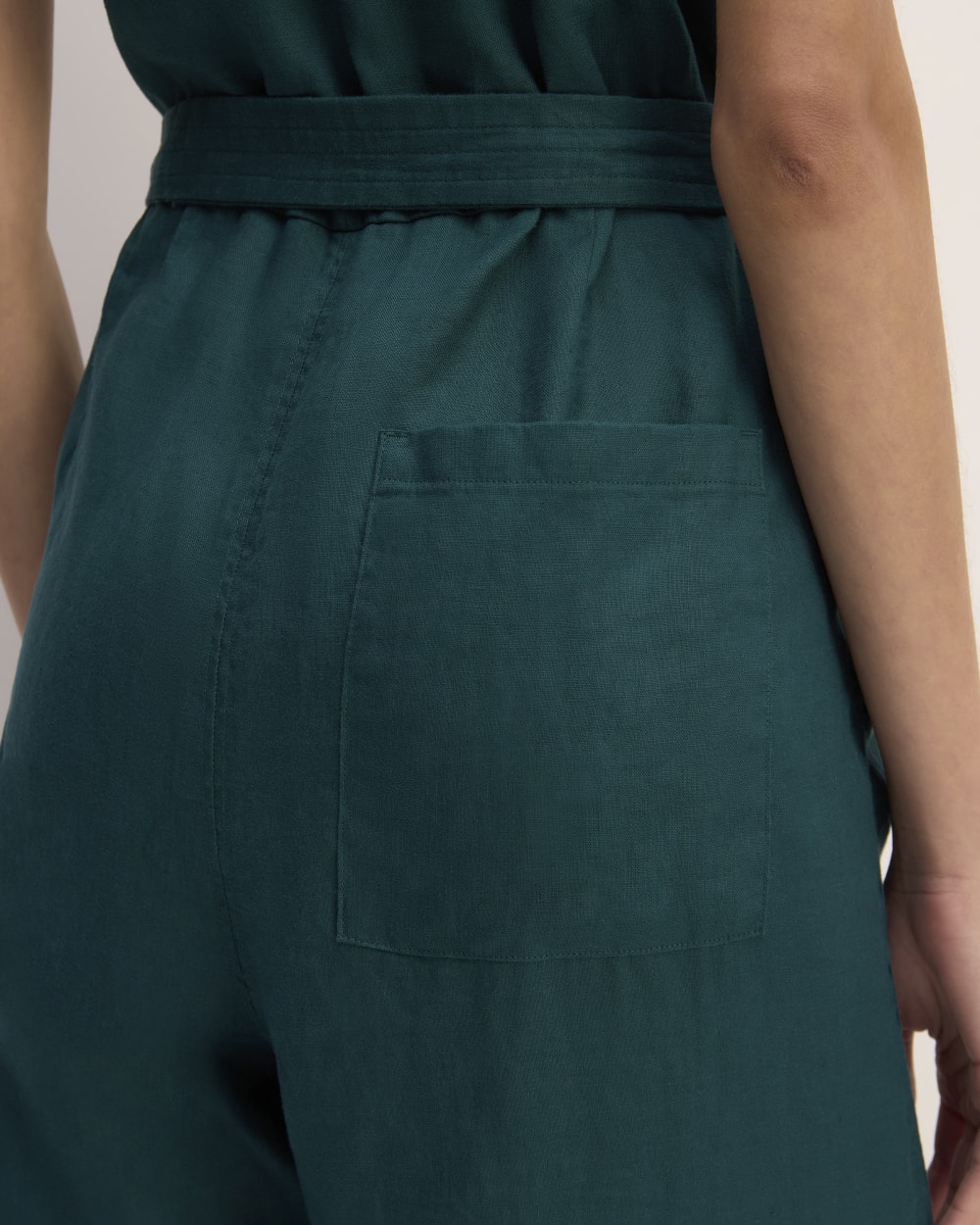 The Linen Side-Button Jumpsuit in Dark Sea — detail view