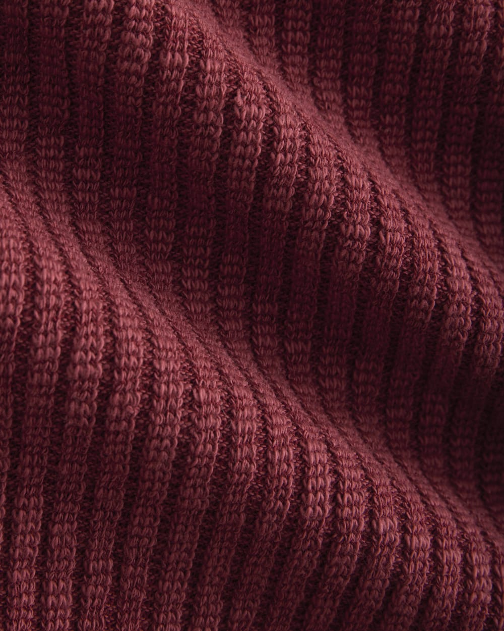 The Cozy Rib Tee in Pomegranate — detail view
