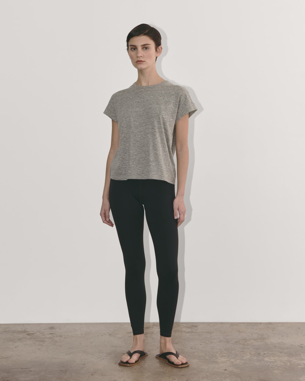 The Perform Tee in Heathered Grey — detail view
