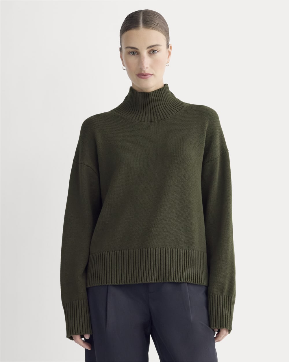 The Boxy Turtleneck in Everyday Cotton in Dark Green — front view