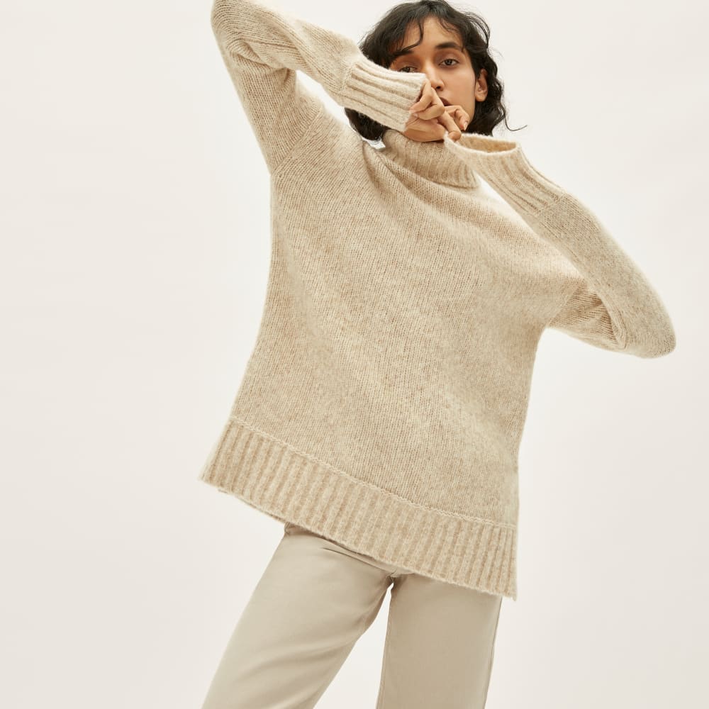 The Cloud Turtleneck in Heathered Ivory — detail view