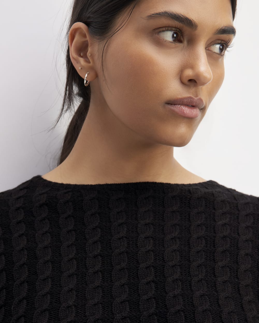 The Cotton Merino Cable Crew in Black — detail view