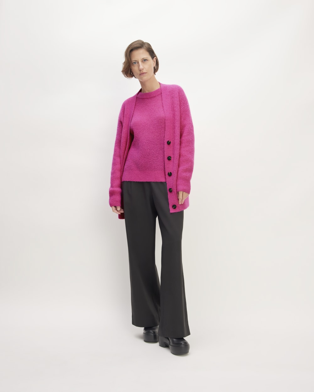 The Alpaca Oversized Cardigan in Fuchsia Pink — detail view