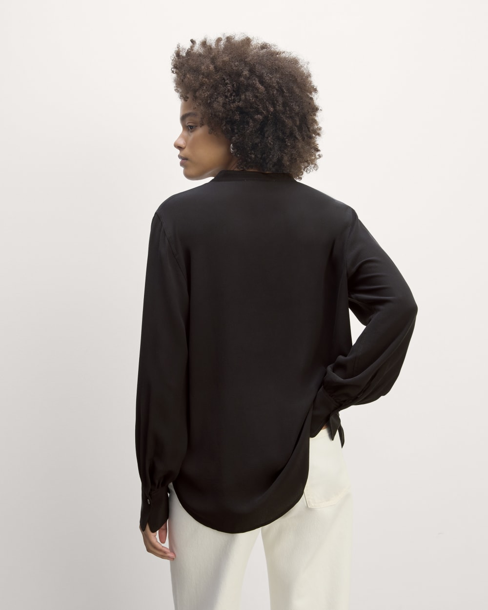 The Henley Shirt in Washable Silk in Black — detail view