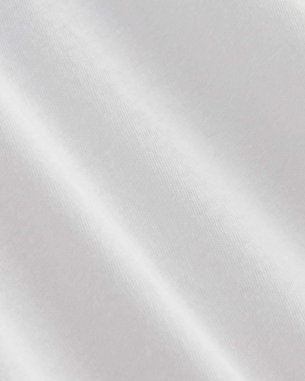 The Slouchy V-Neck Tee in Cotton Linen in White — detail view