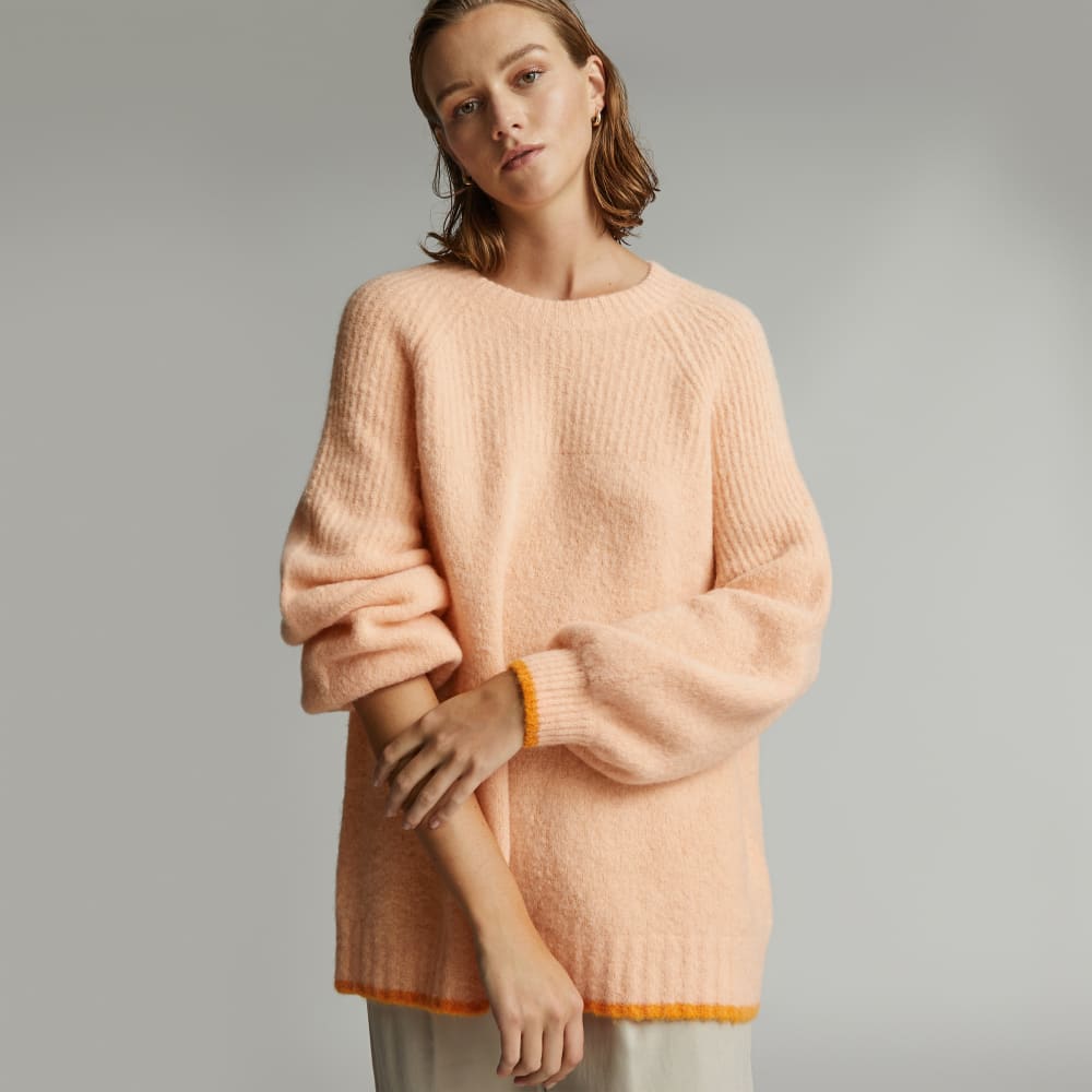 The SuperFuzz Alpaca Oversized Crew in Apricot — front view