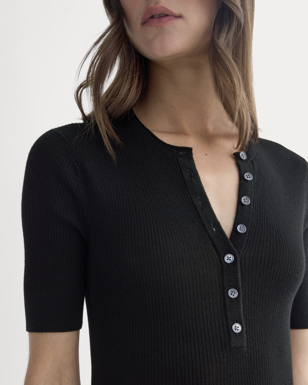 The Short-Sleeve Henley in Ultrasoft Merino in Black — detail view