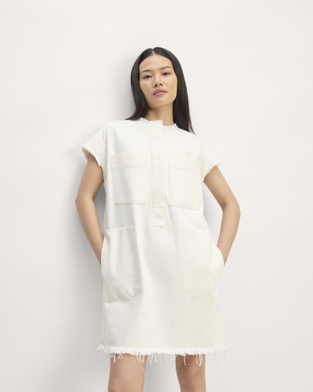 The Denim Workwear Shirtdress in Frayed Hem Bone — detail view