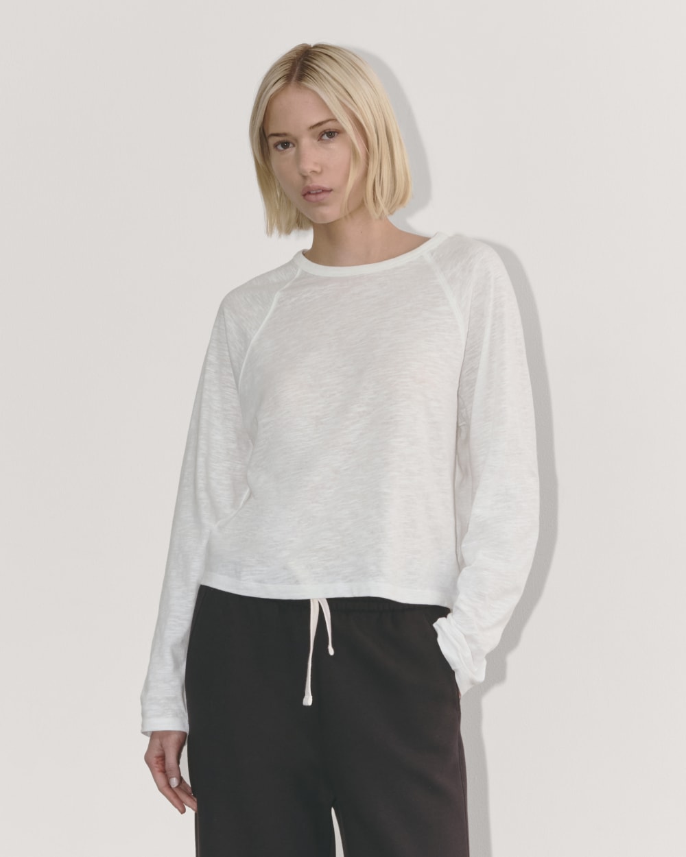 The Perform Crew Tee in White — front view