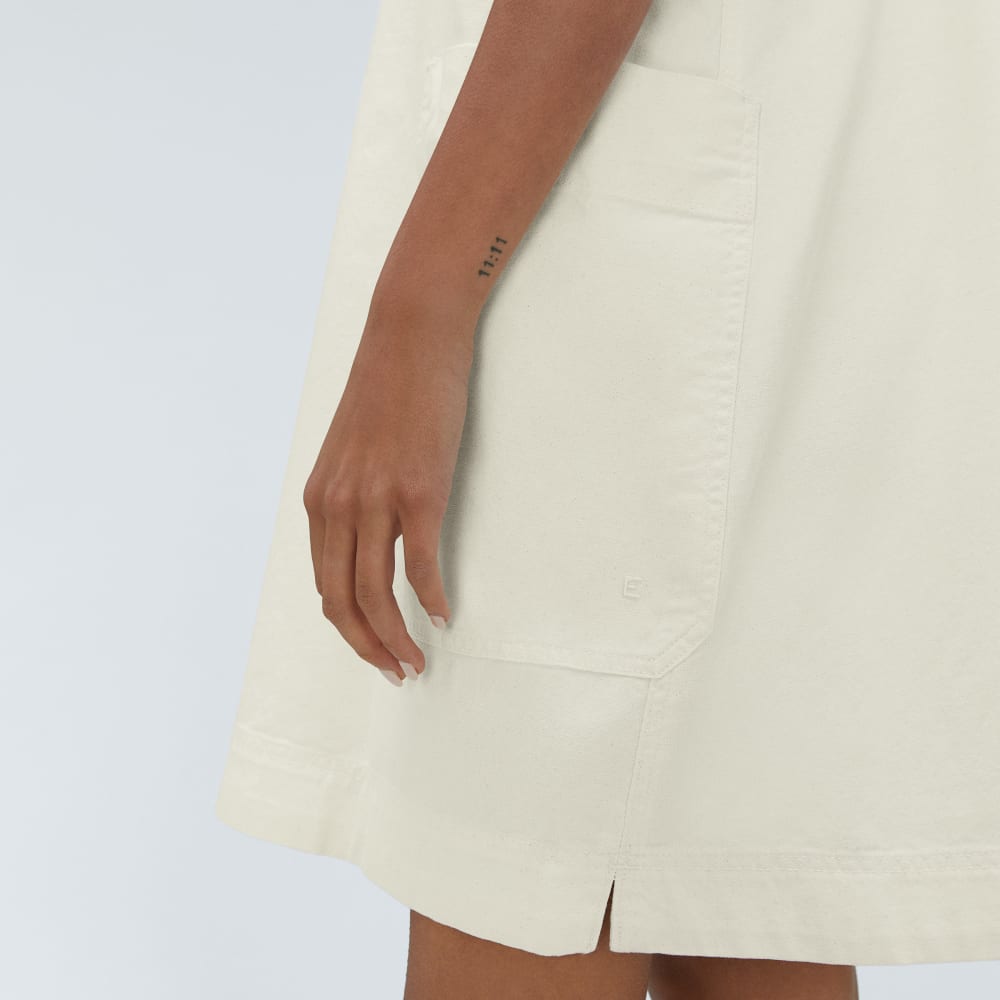 The Cross-Back Apron Mini Dress in Canvas — detail view