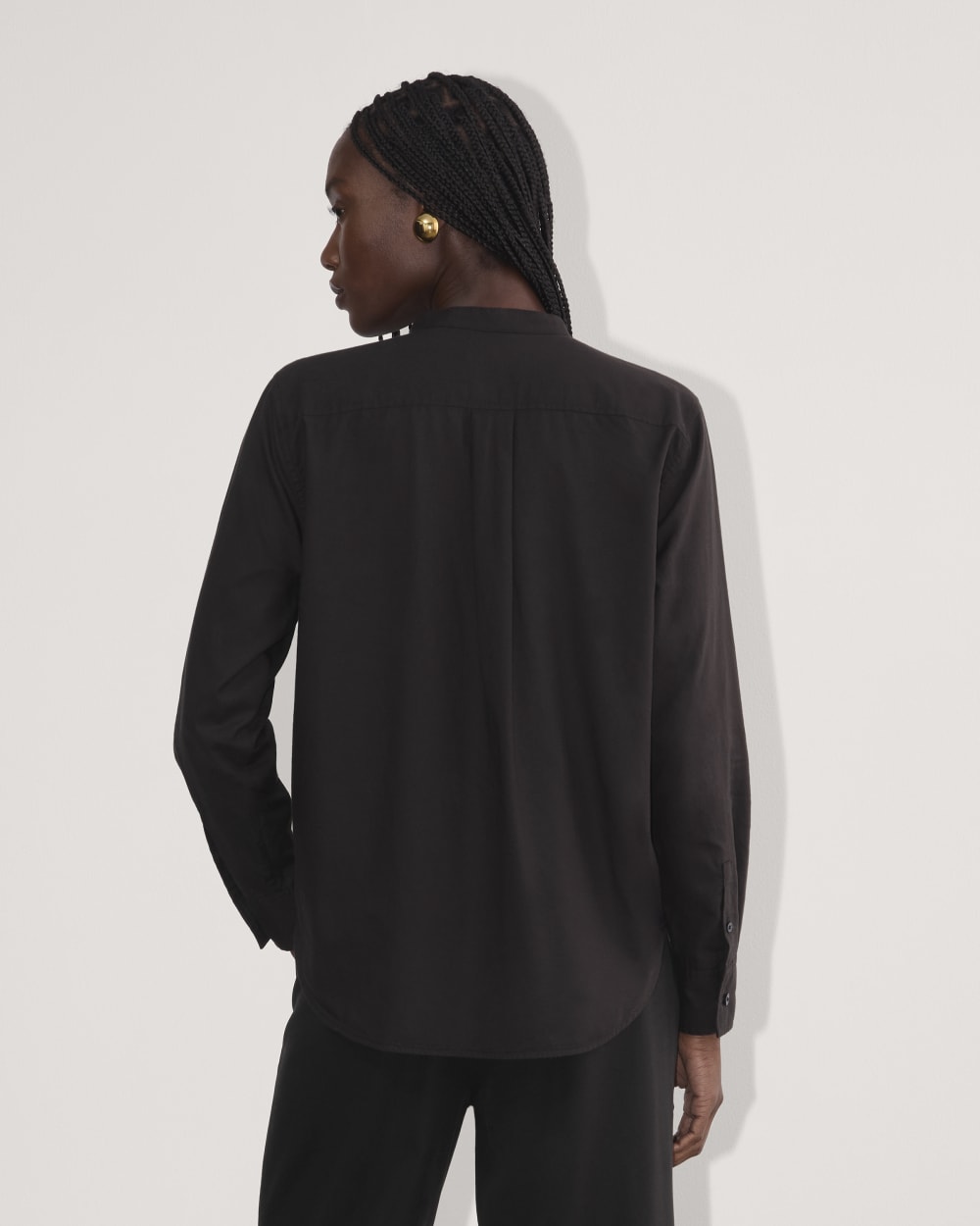 The Tuxedo Shirt in Silky Cotton in Black — detail view