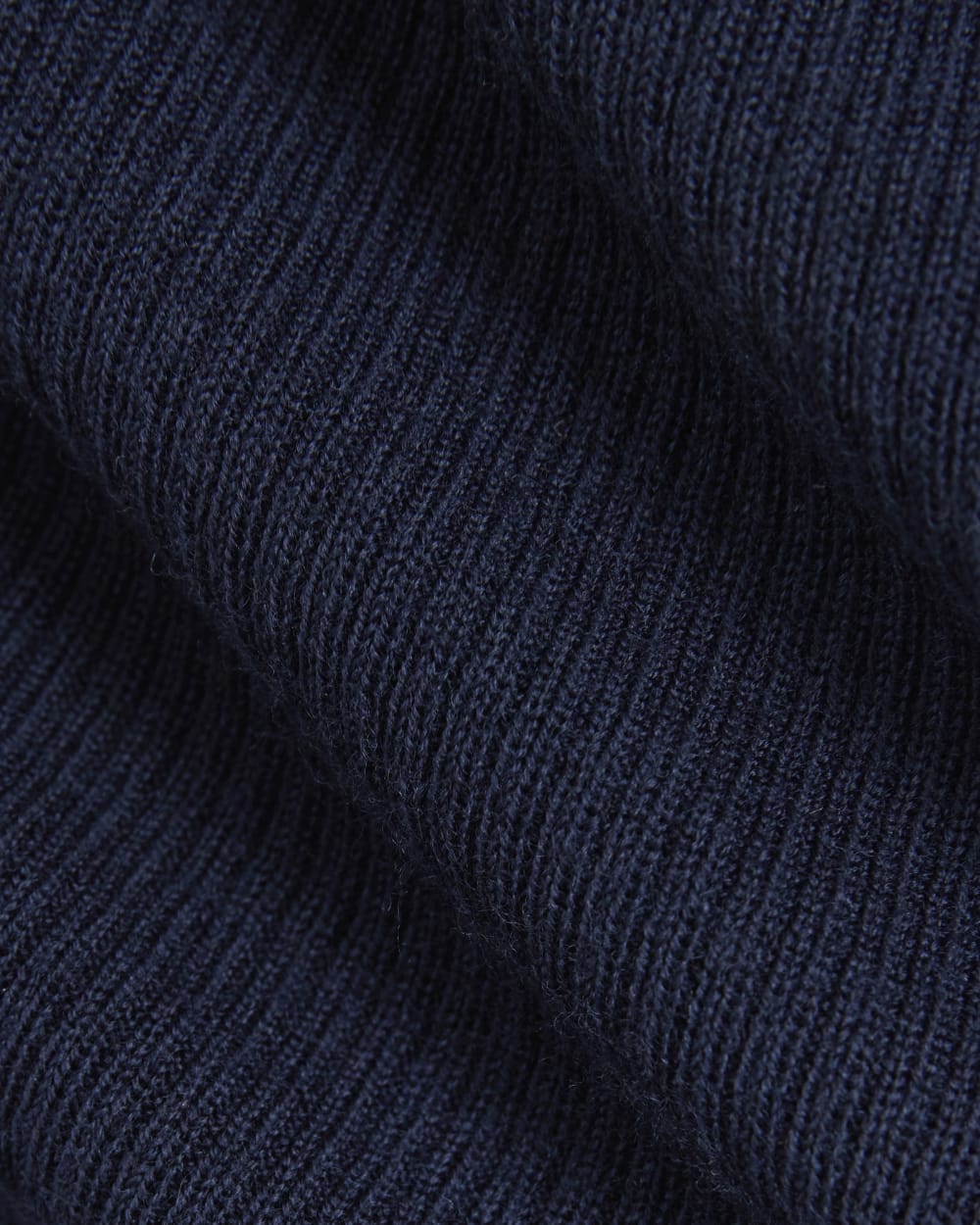 The Cardigan in Ultrasoft Merino in Navy — detail view