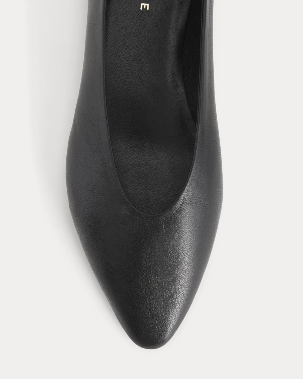 Made in Italy Almond-Toe Flat in Black Leather — detail view