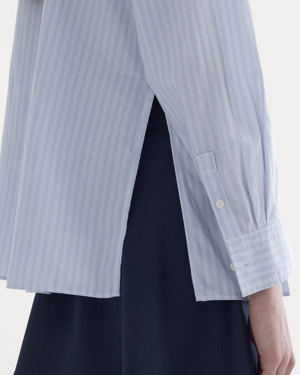The Pleated Shirt in Silky Cotton in Forever Blue / Optic White — detail view