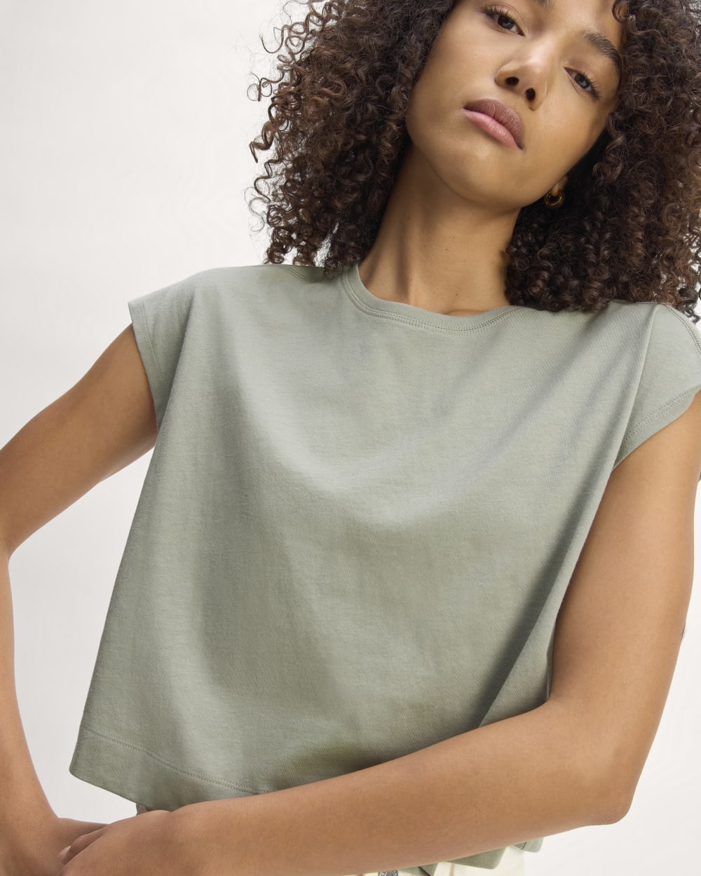 The Muscle Cropped Tee in Essential Cotton in Sage Green — detail view