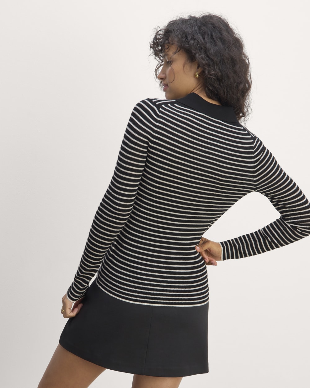The Polo in Ultrasoft Merino in Black / Bone — detail view
