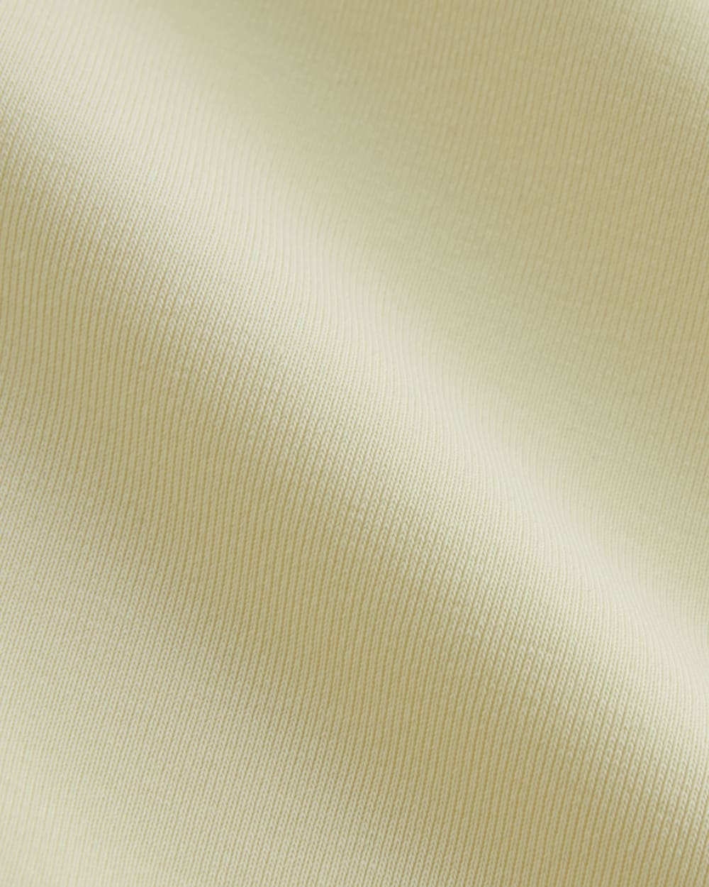 The Draped Top in Butterknit in Light Yellow — detail view
